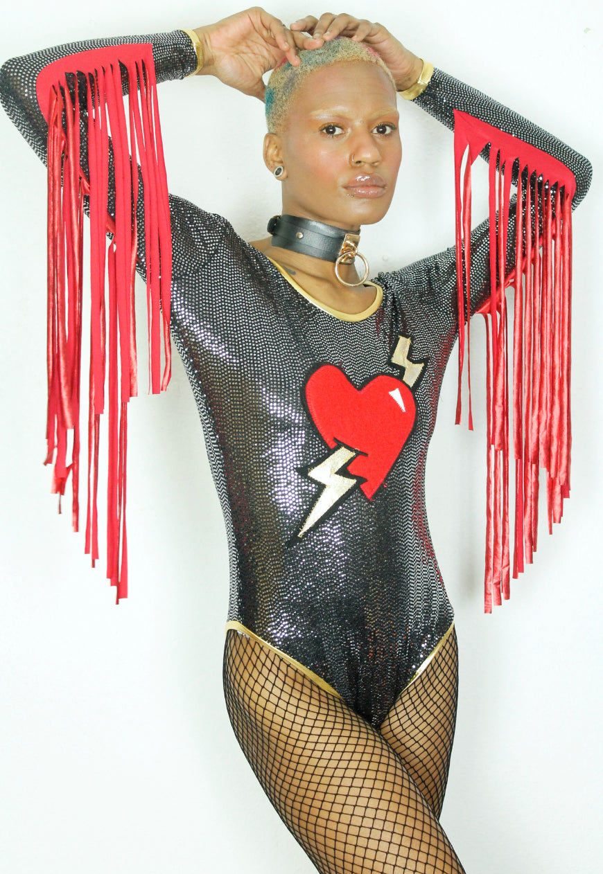 LOVE LIES BLEEDING - Sequin bodysuit heart and lightening bolt applique and fringe