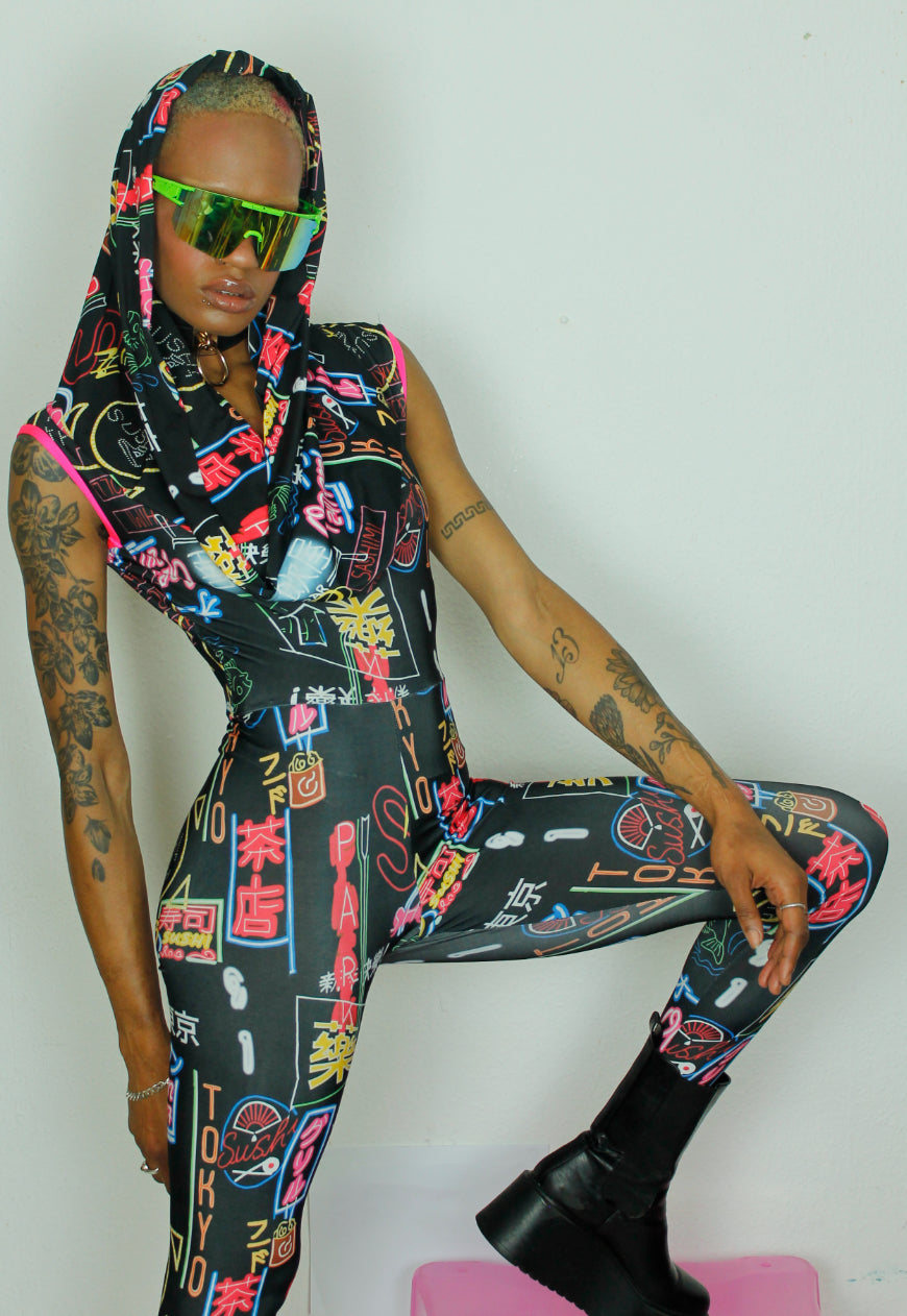 OSAKA - Hooded black cowl neck jumpsuit with neon sign graphic print