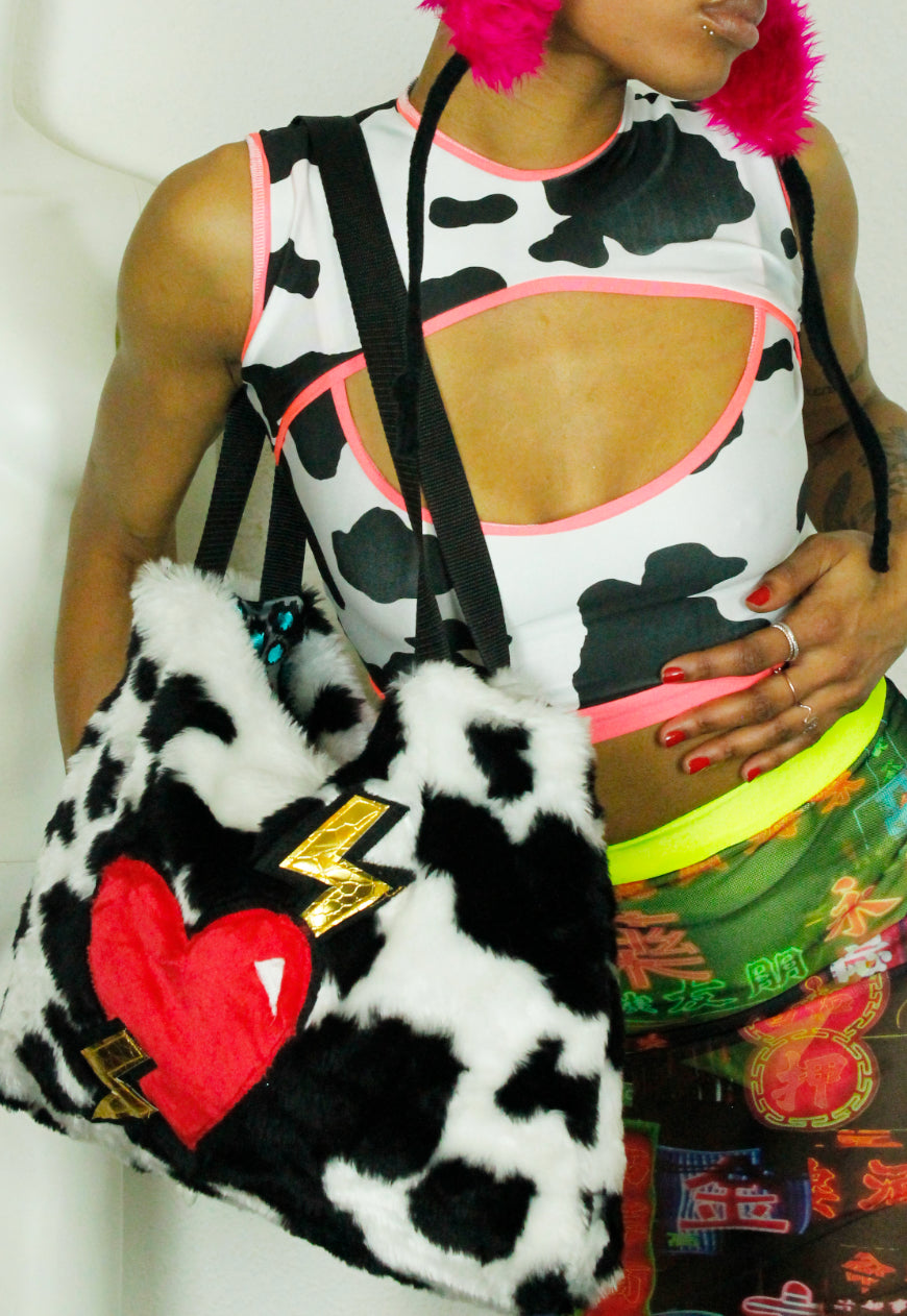 DAIRY QUEEN Cow print peekaboo crop top with neon trim