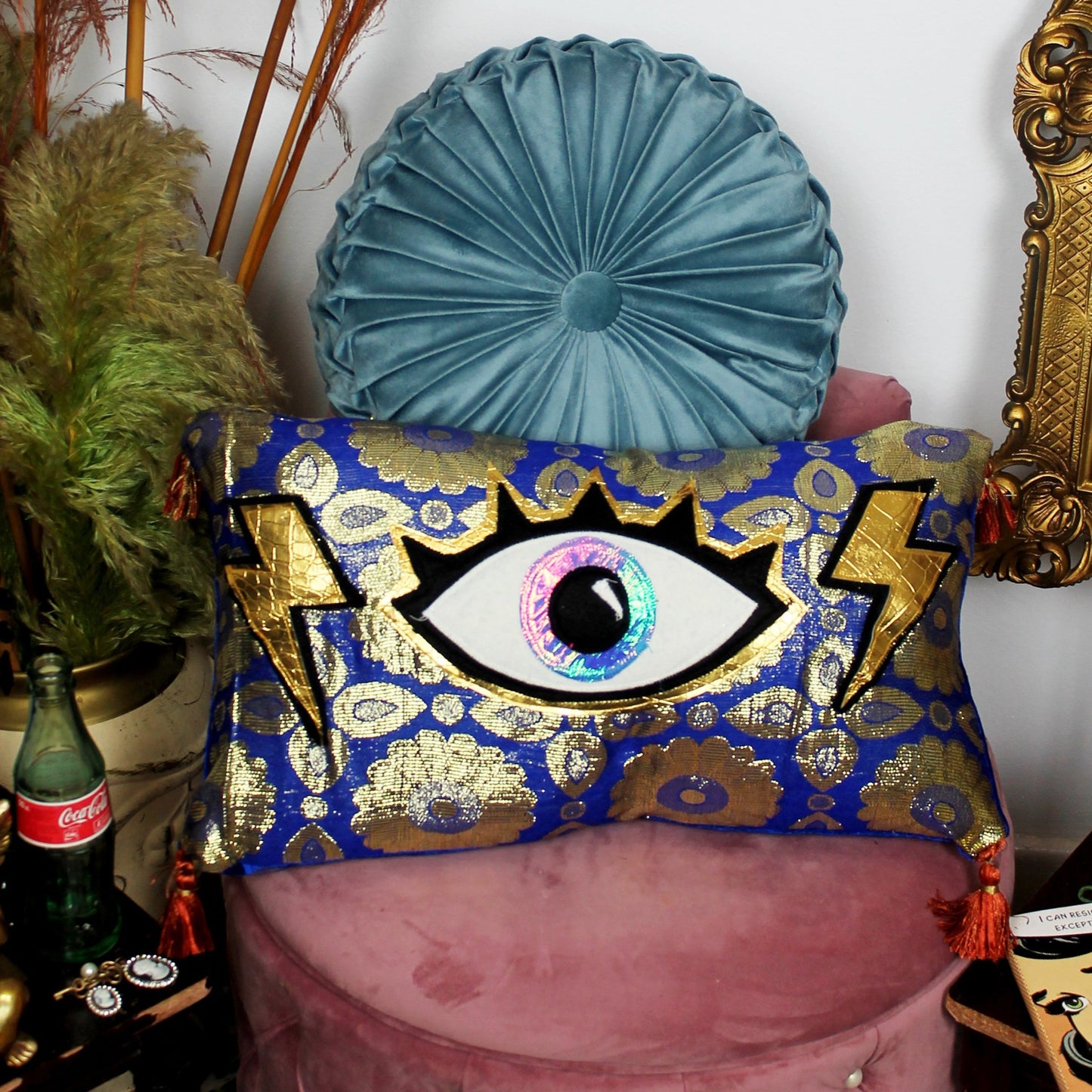 Eye For An Eye - handmade decorative throw cushion with eye appliqué in gold and blue baroque fabric.
