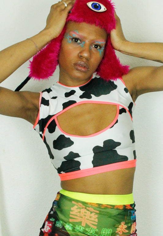 DAIRY QUEEN Cow print peekaboo crop top with neon trim