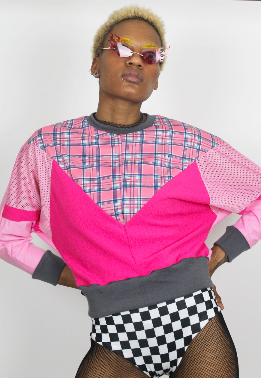 Dionne - Batwing colour block sweater with pink tartan panel