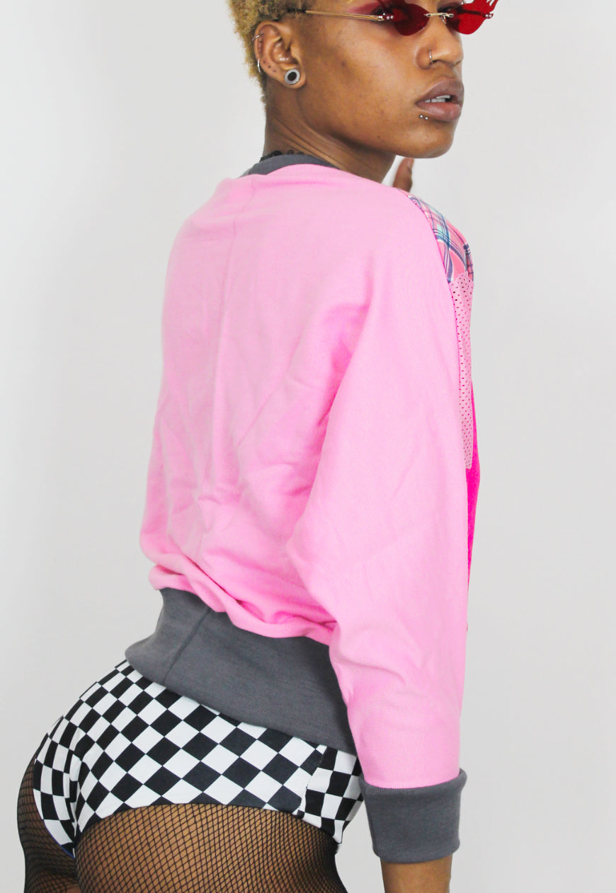 Dionne - Batwing colour block sweater with pink tartan panel