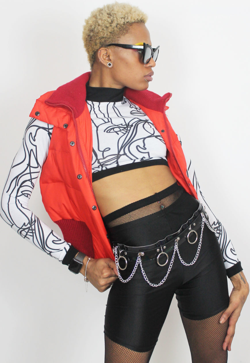 Face Off - Long sleeved white crop top with abstract face print