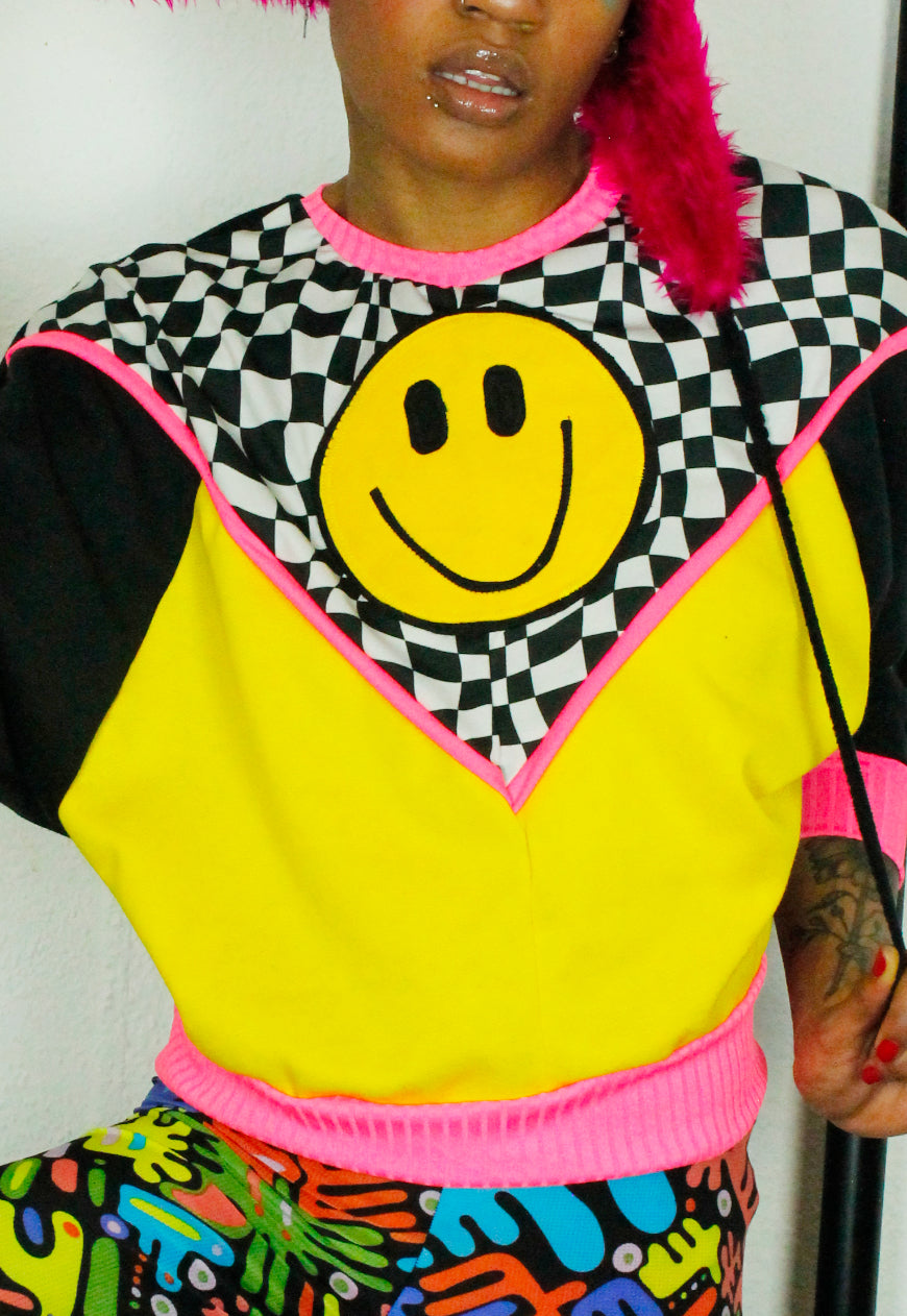 FREEDOM Checkerboard and yellow batwing sweat with 90’s smile detail and neon trim