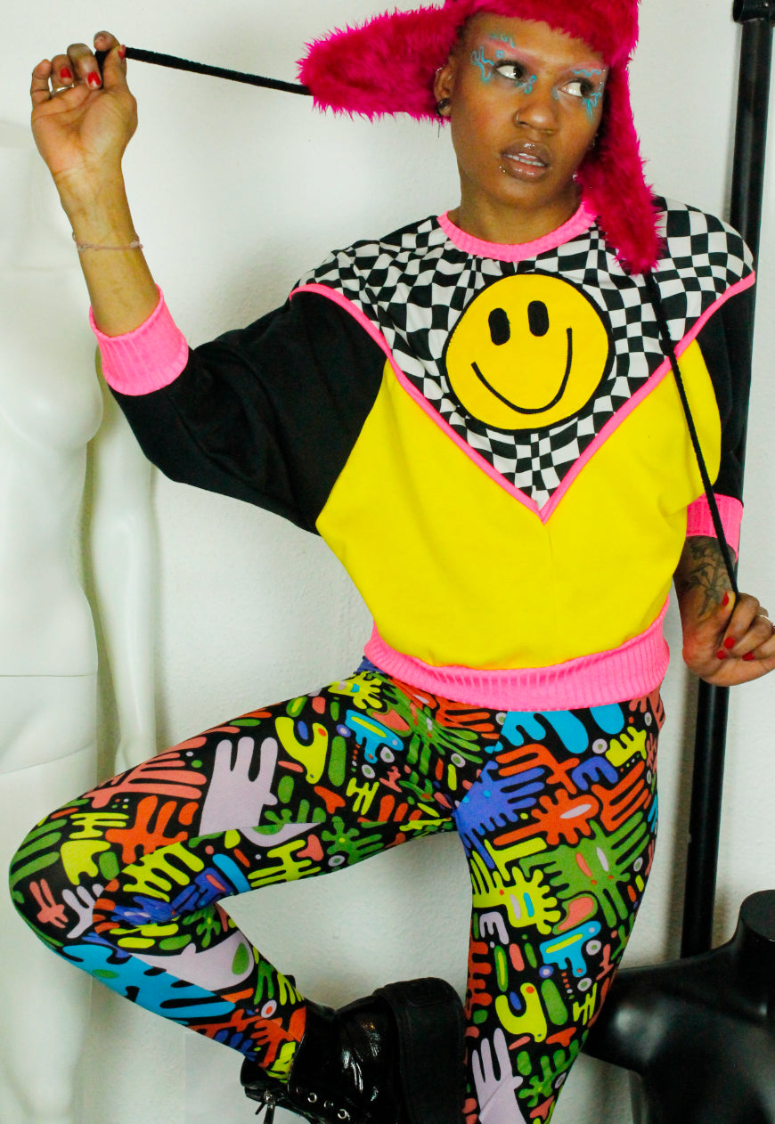 FREEDOM Checkerboard and yellow batwing sweat with 90’s smile detail and neon trim