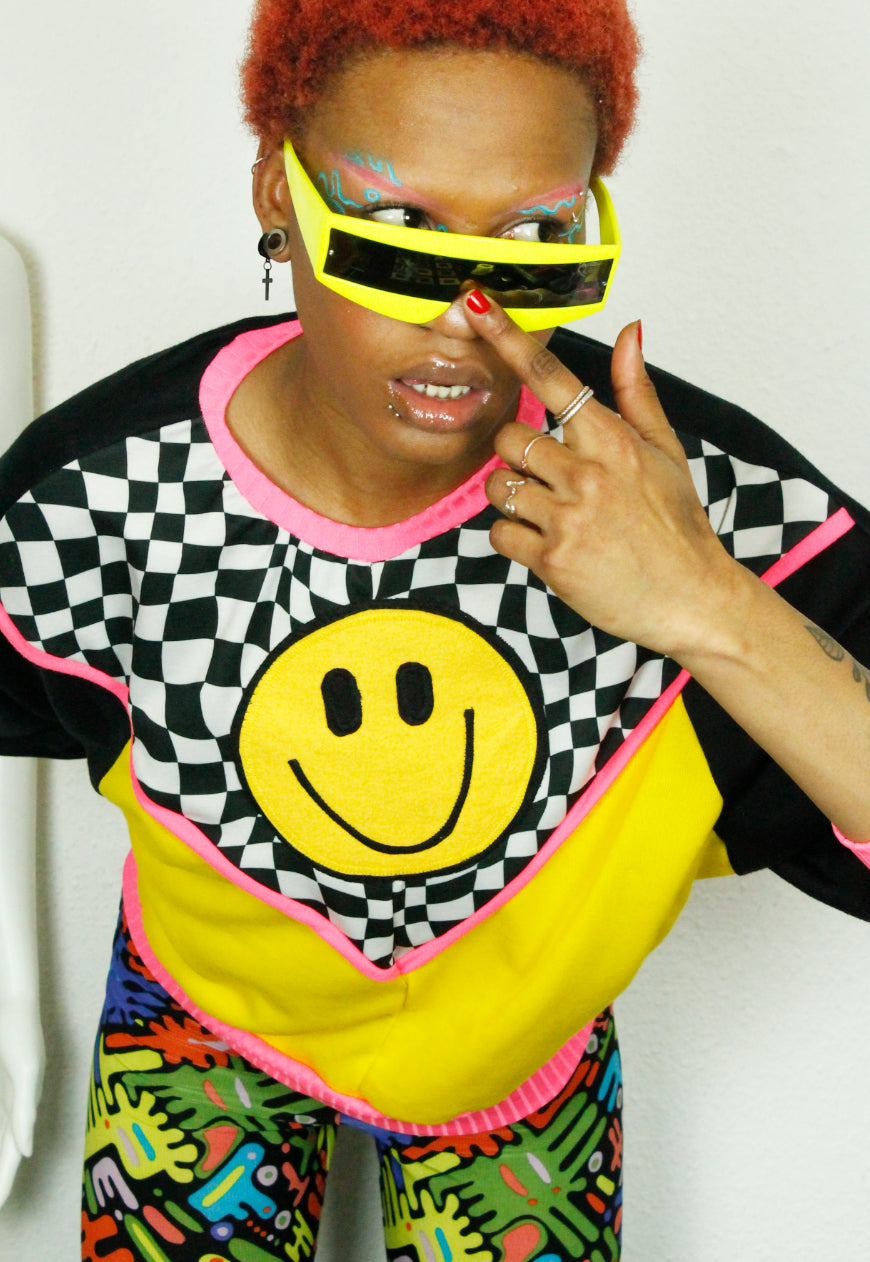 FREEDOM Checkerboard and yellow batwing sweat with 90’s smile detail and neon trim