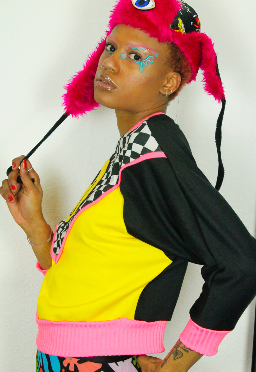 FREEDOM Checkerboard and yellow batwing sweat with 90’s smile detail and neon trim