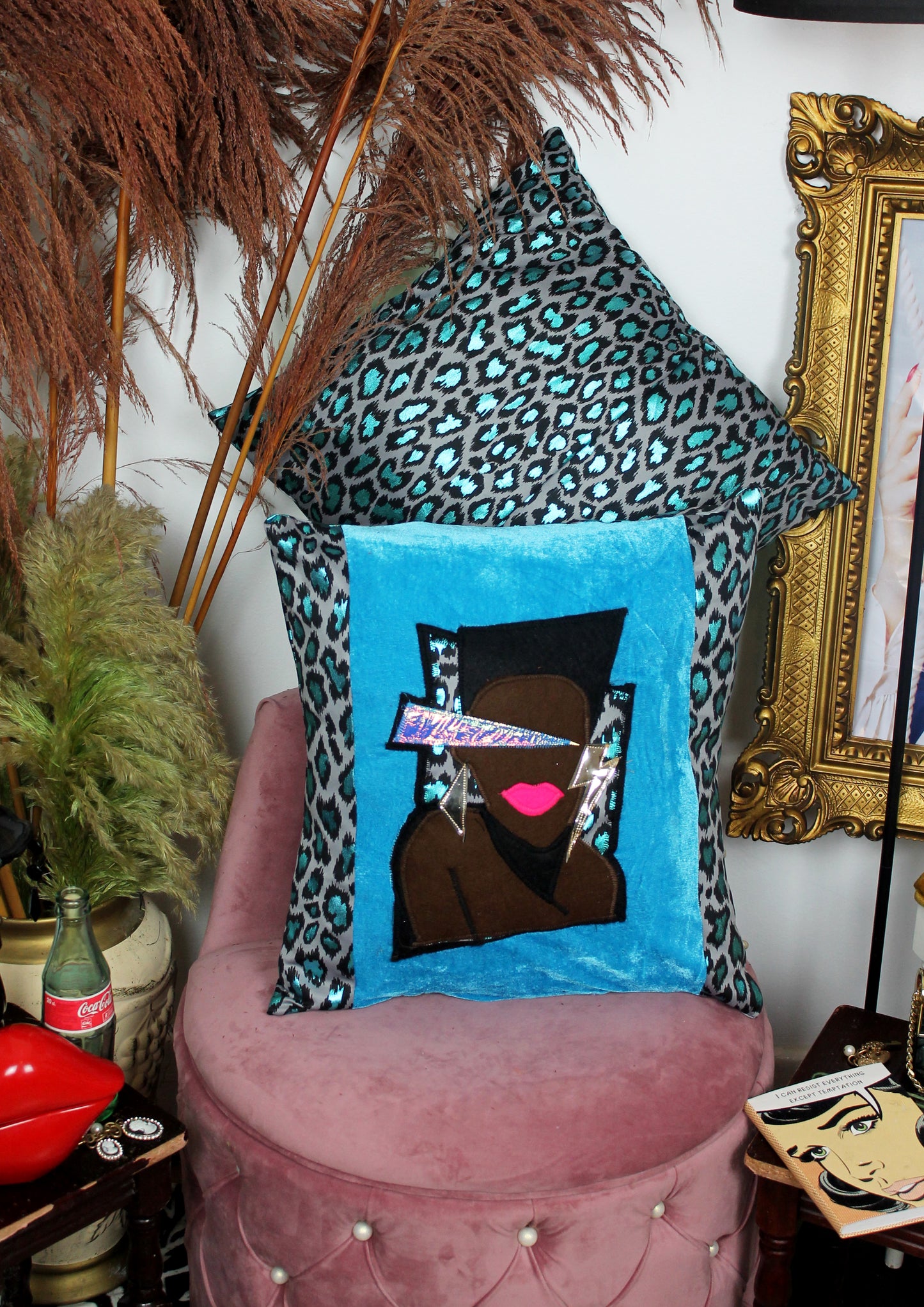 Libertango - handmade throw cushion in blue velvet and blue leopard print with 80’s Grace Jones face appliqué.