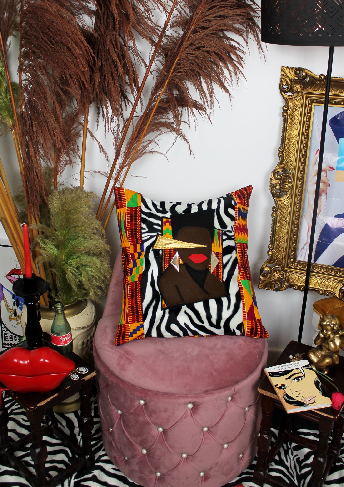 Traveller - decorative throw cushion in zebra and kente with Grace Jones design