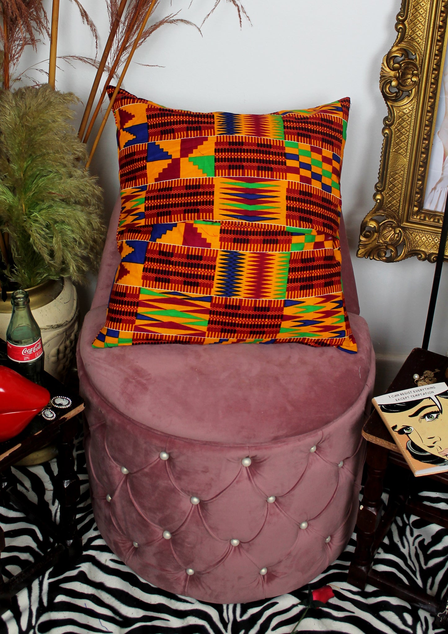Traveller - decorative throw cushion in zebra and kente with Grace Jones design