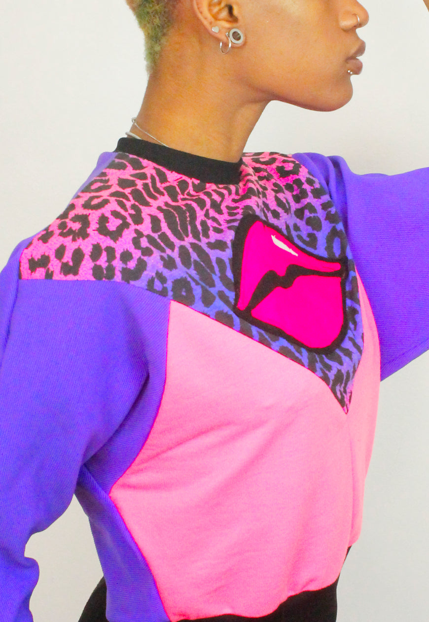Juicy Kisses - Leopard batwing sweater with lips applique.