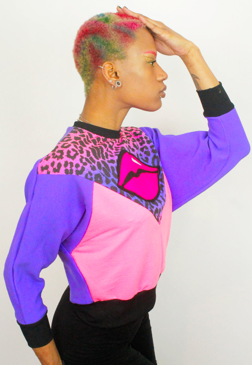 Juicy Kisses - Leopard batwing sweater with lips applique.