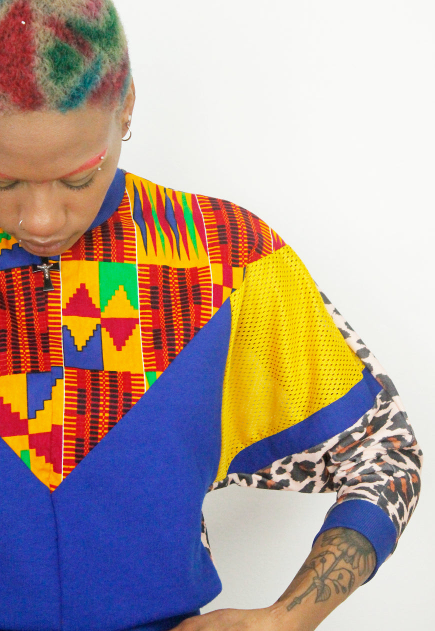 Kente - Leopard print and colour block batwing sweater with kente panel