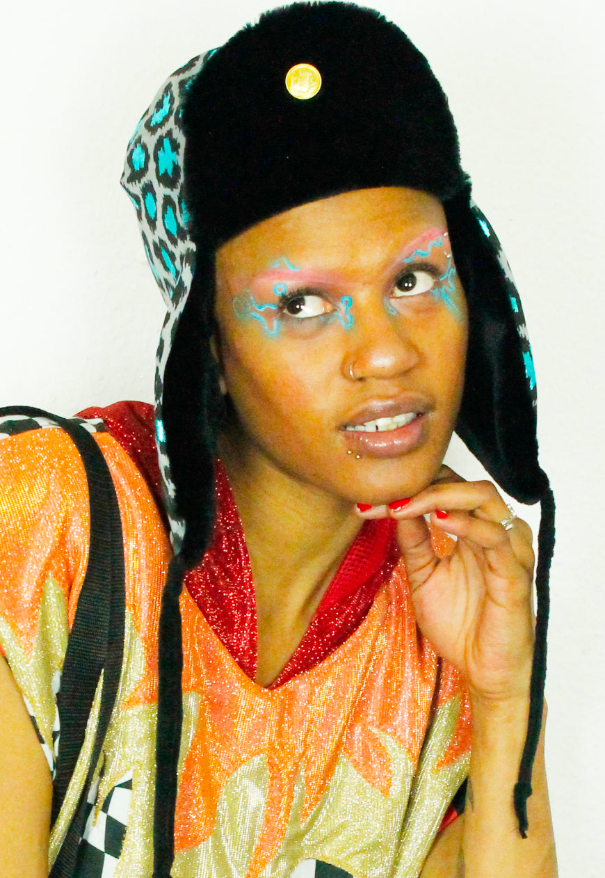 LEO Metallic Blue leopard trapper hat with black faux fur lining