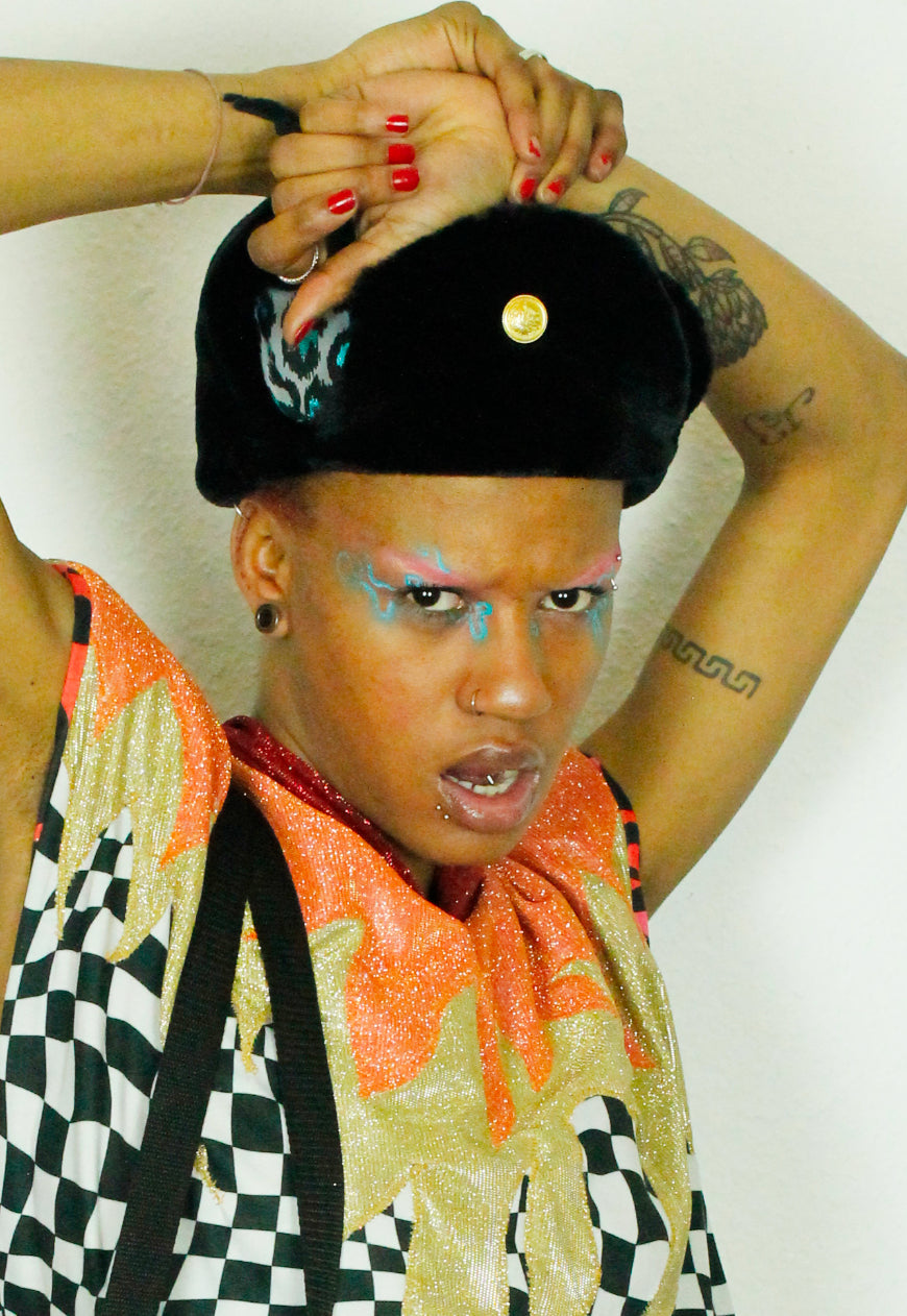 LEO Metallic Blue leopard trapper hat with black faux fur lining