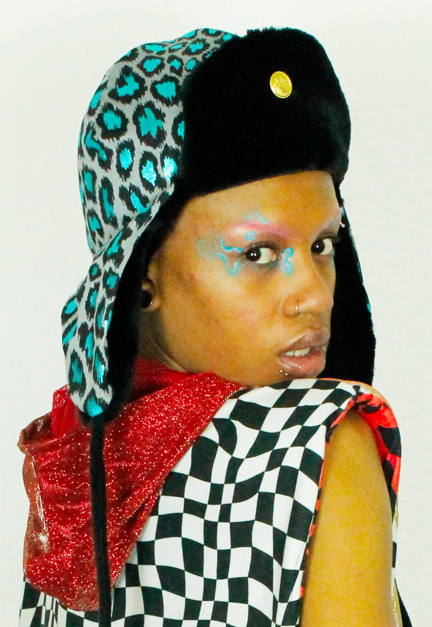 LEO Metallic Blue leopard trapper hat with black faux fur lining