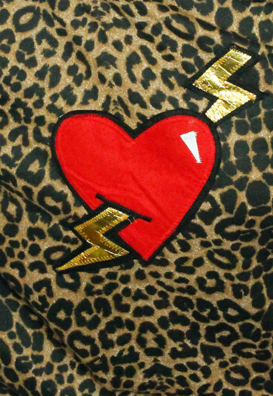 LOVE HURTS Leopard and black oversize sweater with large heart and lightning bolts