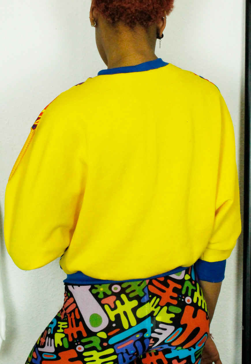 MASAI Zebra, kente and yellow panelled batwing jumper