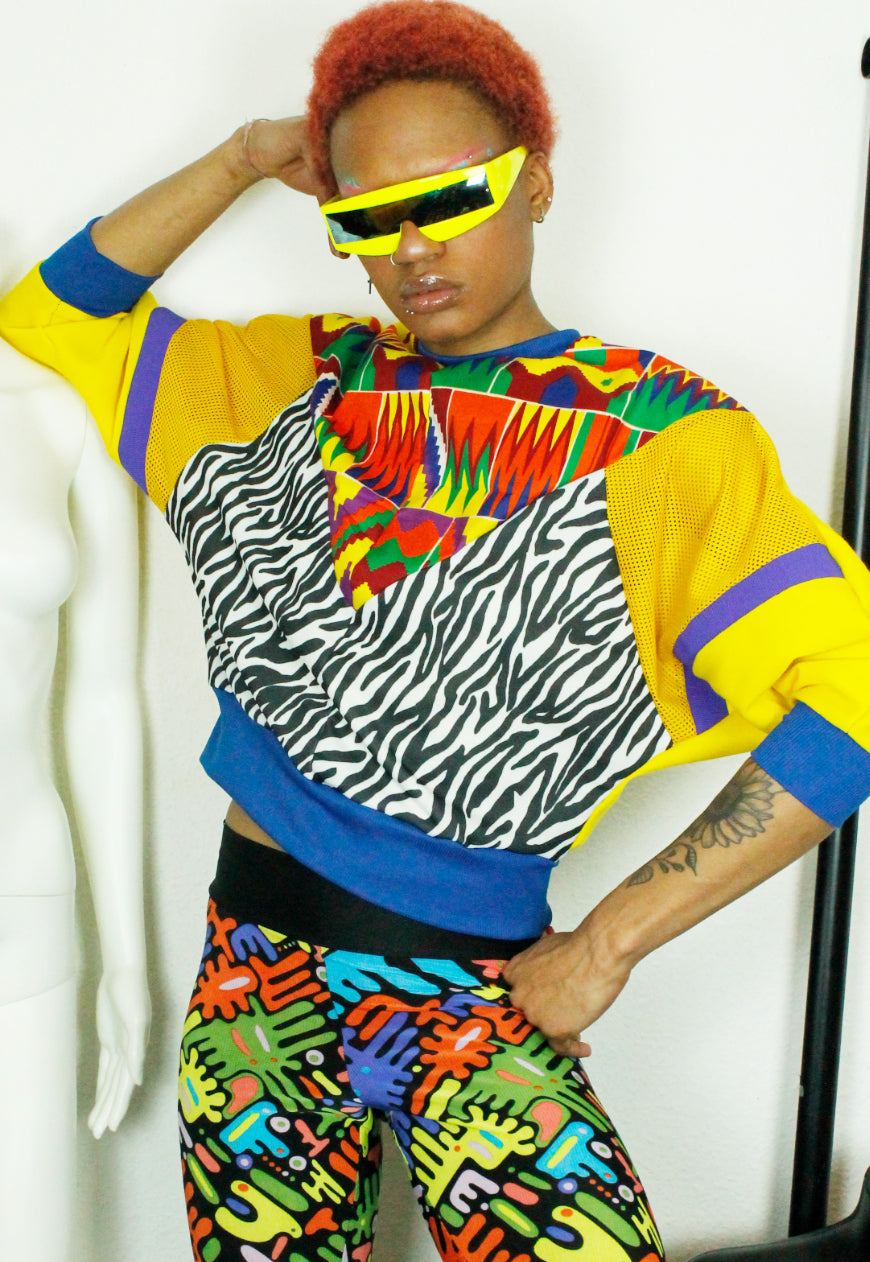 MASAI Zebra, kente and yellow panelled batwing jumper