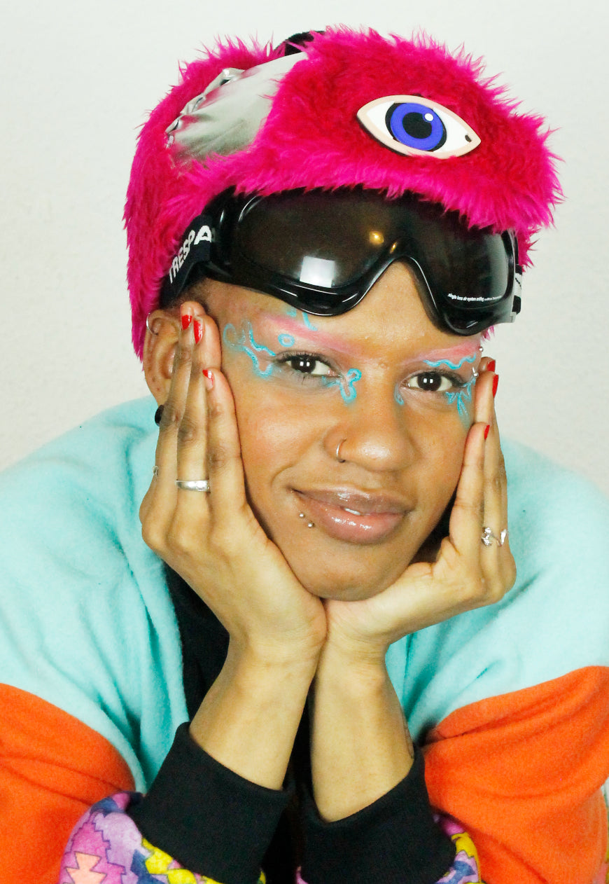 MOONRAKER Metallic silver trapper hat with pink faux fur and third eye