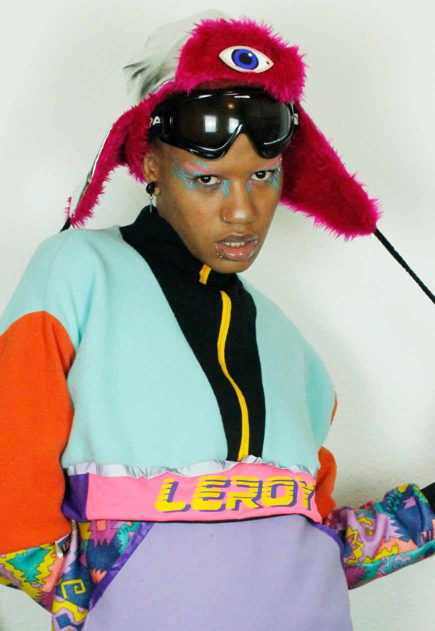 MOONRAKER Metallic silver trapper hat with pink faux fur and third eye