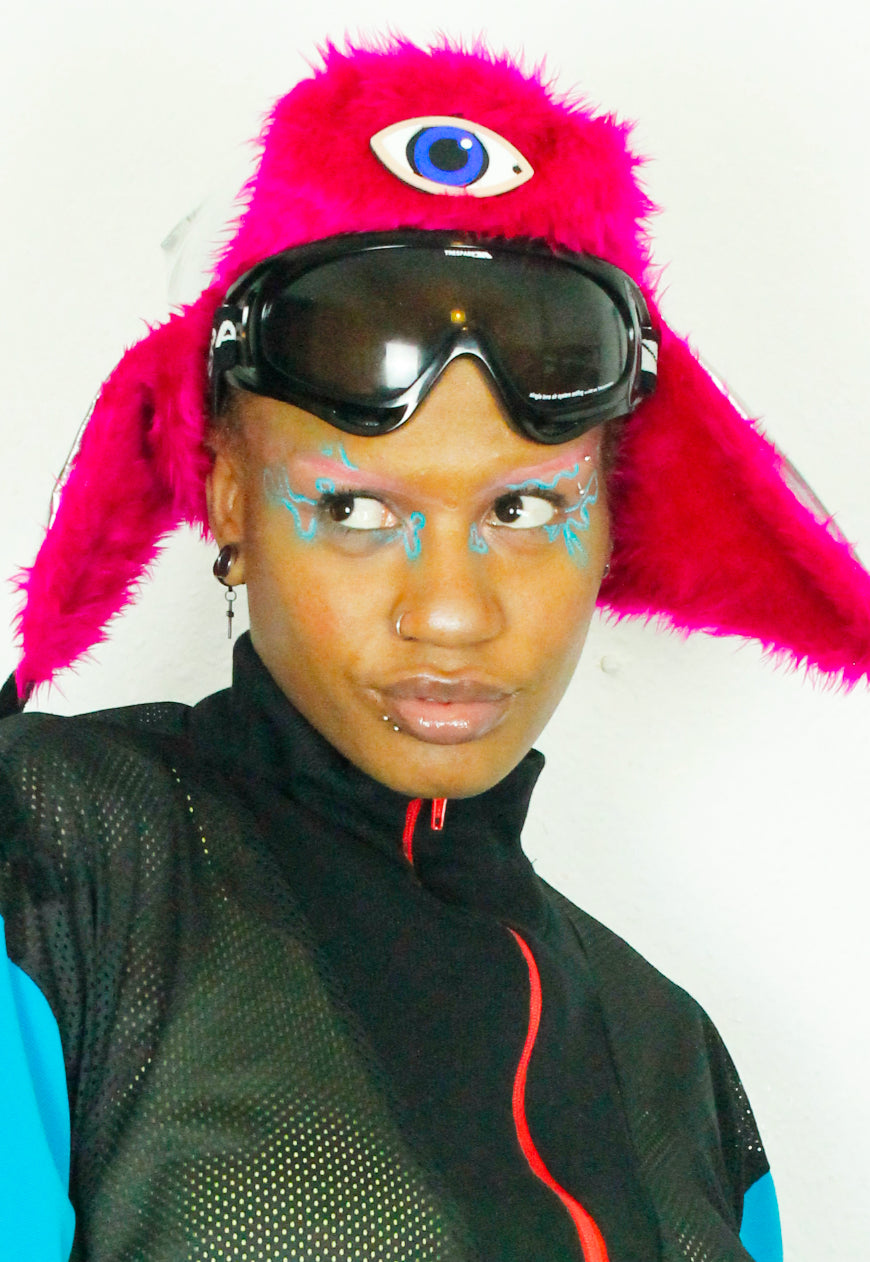 MOONRAKER Metallic silver trapper hat with pink faux fur and third eye