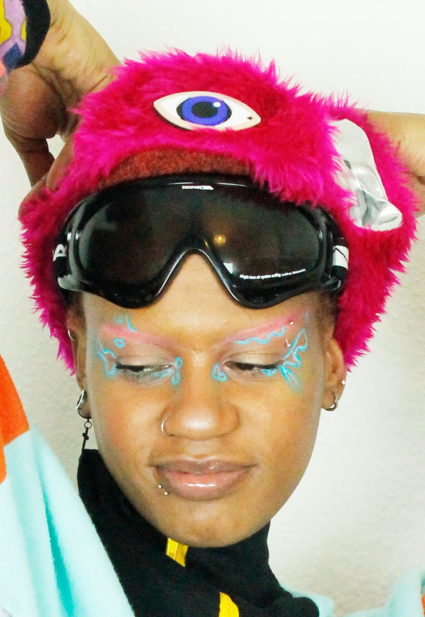 MOONRAKER Metallic silver trapper hat with pink faux fur and third eye