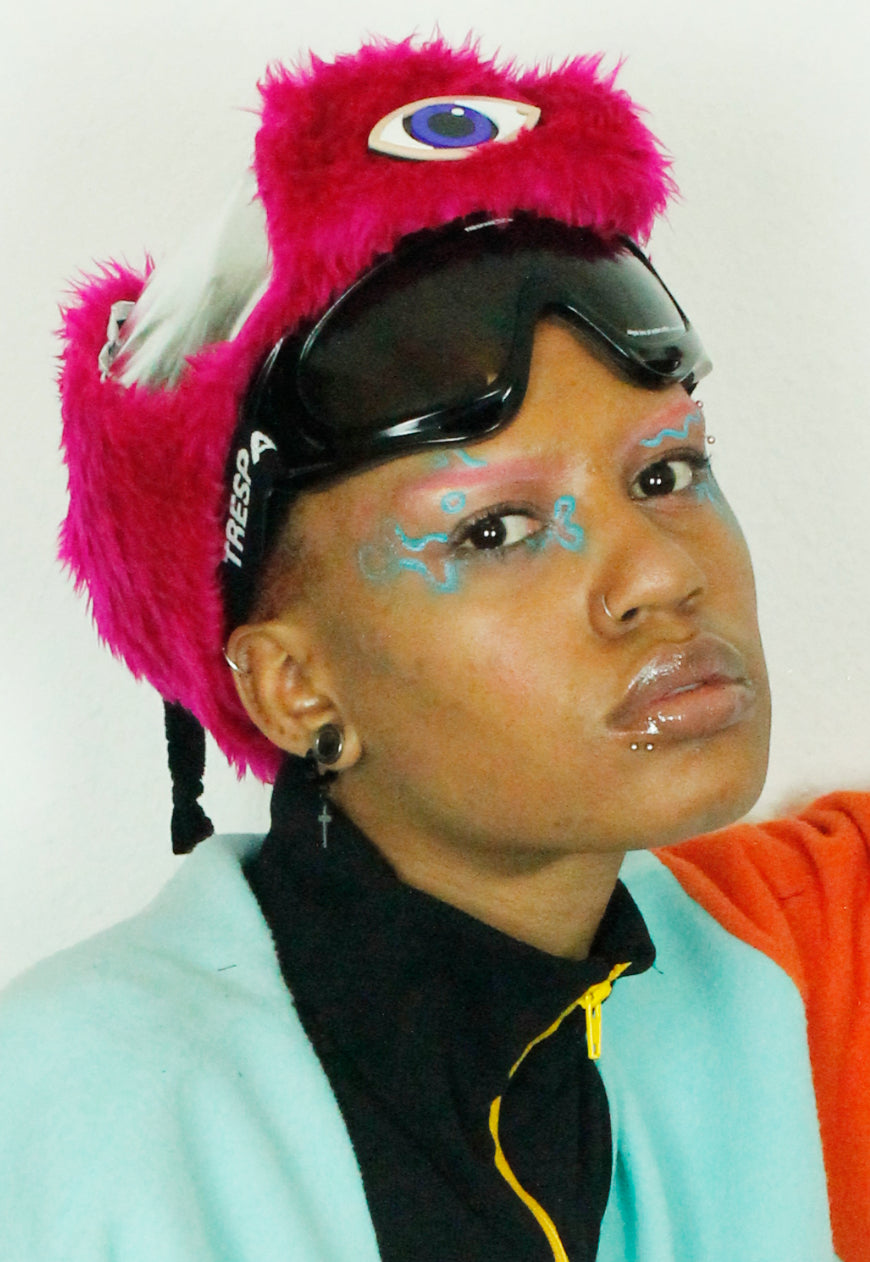 MOONRAKER Metallic silver trapper hat with pink faux fur and third eye