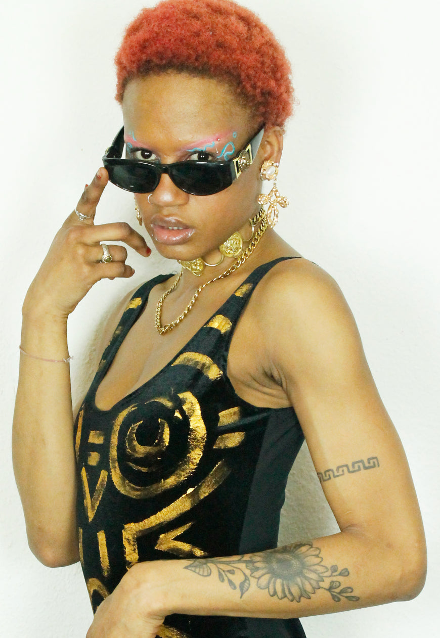 NAOMI Black velvet bodysuit with hand painted gold tribal markings