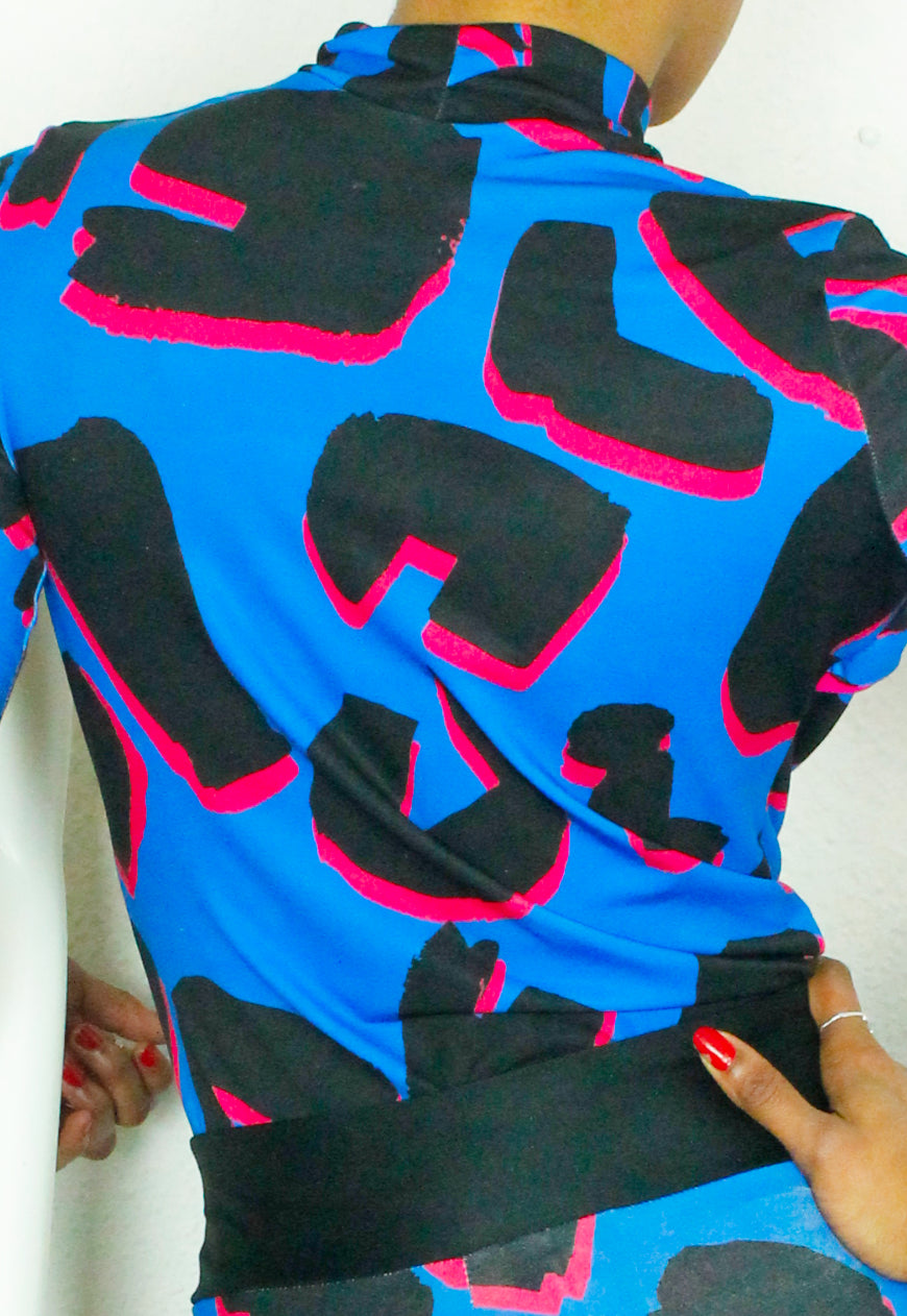 PANTHER TOP Blue and pink abstract leopard print peekaboo top