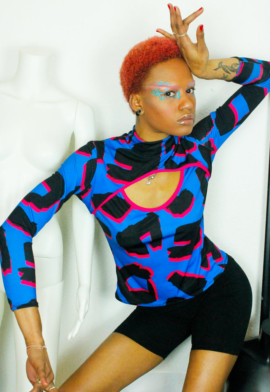PANTHER TOP Blue and pink abstract leopard print peekaboo top