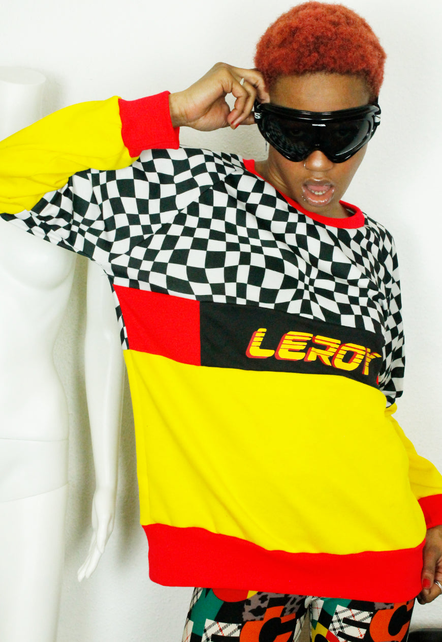 QUIRKY Logo panel yellow, red and checkerboard oversized sweater