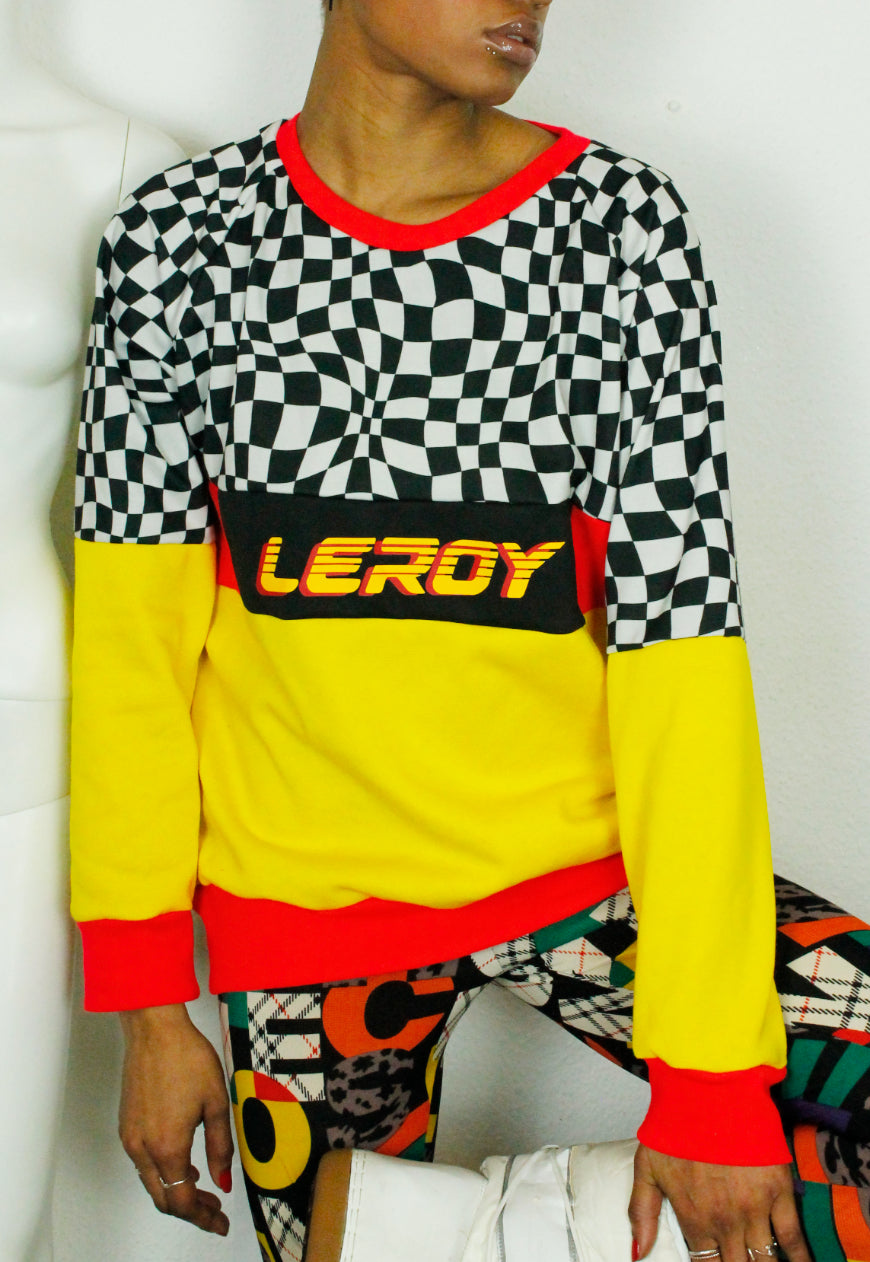 QUIRKY Logo panel yellow, red and checkerboard oversized sweater
