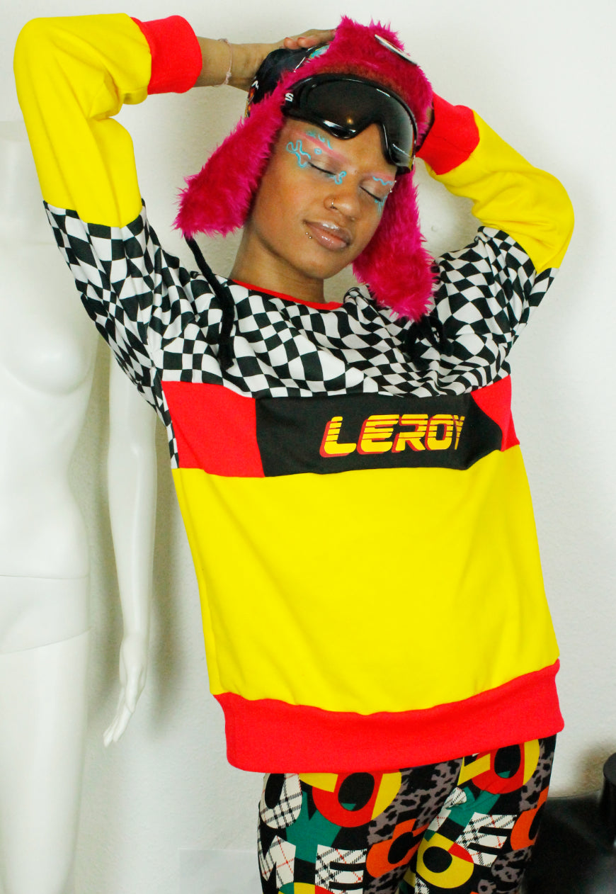 QUIRKY Logo panel yellow, red and checkerboard oversized sweater