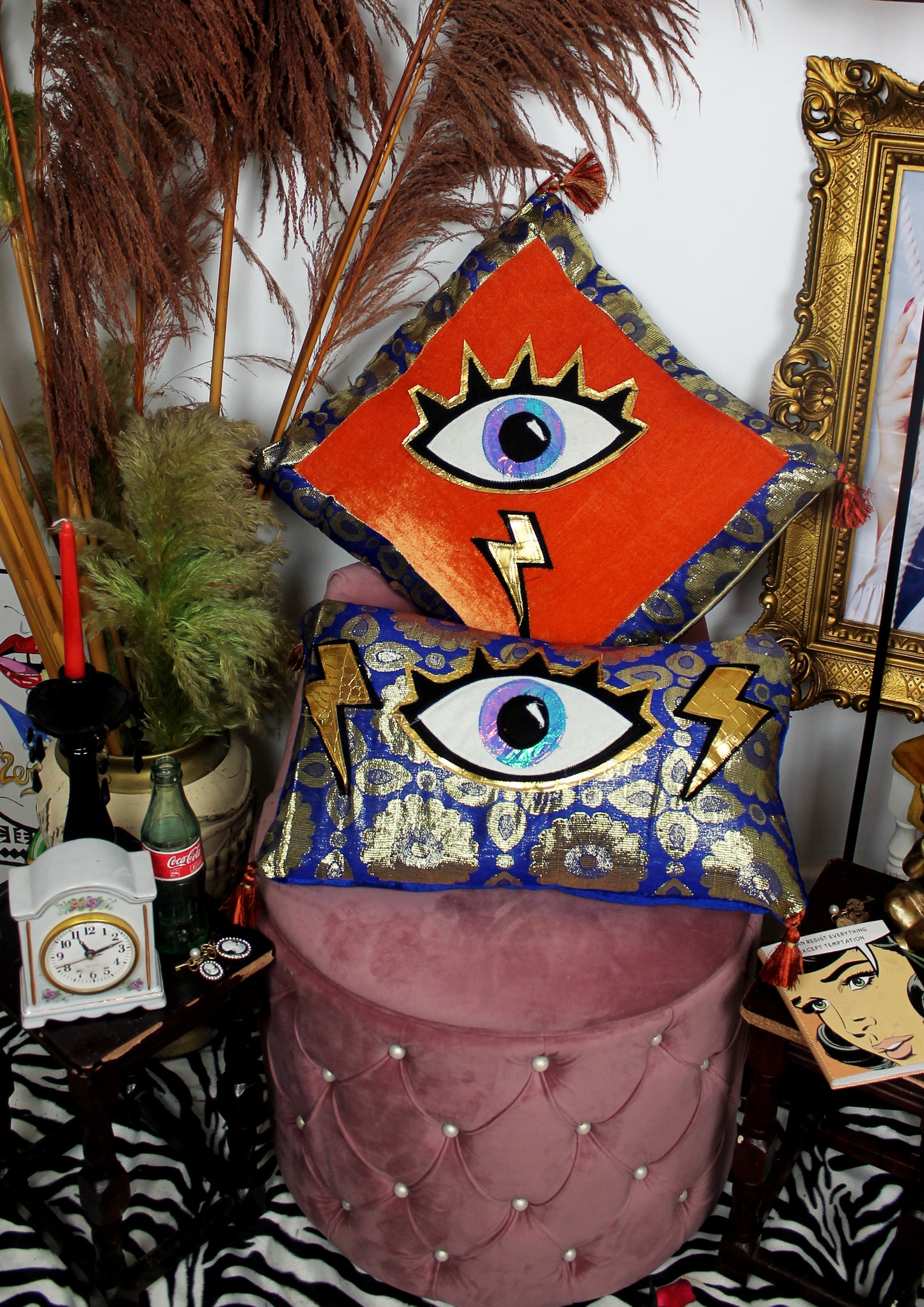 Eye For An Eye - handmade decorative throw cushion with eye appliqué in gold and blue baroque fabric.