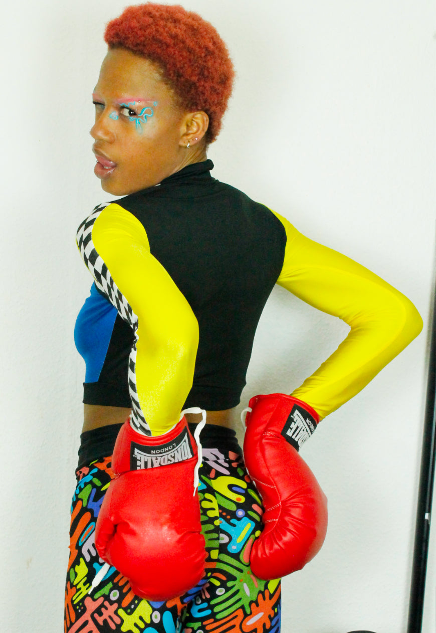 TRAILBLAZER BRIGHT Yellow and blue peekaboo top with checkerboard sleeve detail