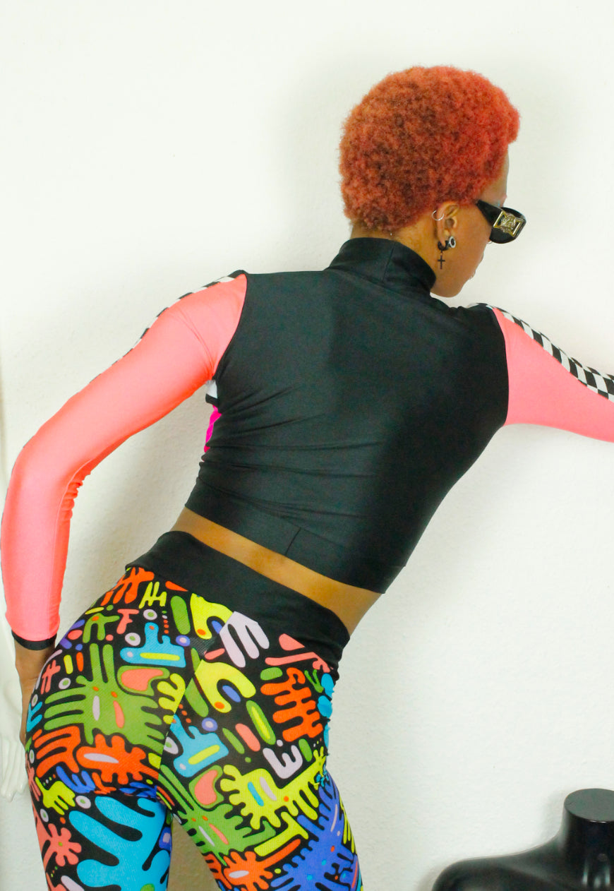 TRAILBLAZER NEON Pink neon peekaboo top with checkerboard sleeve detail