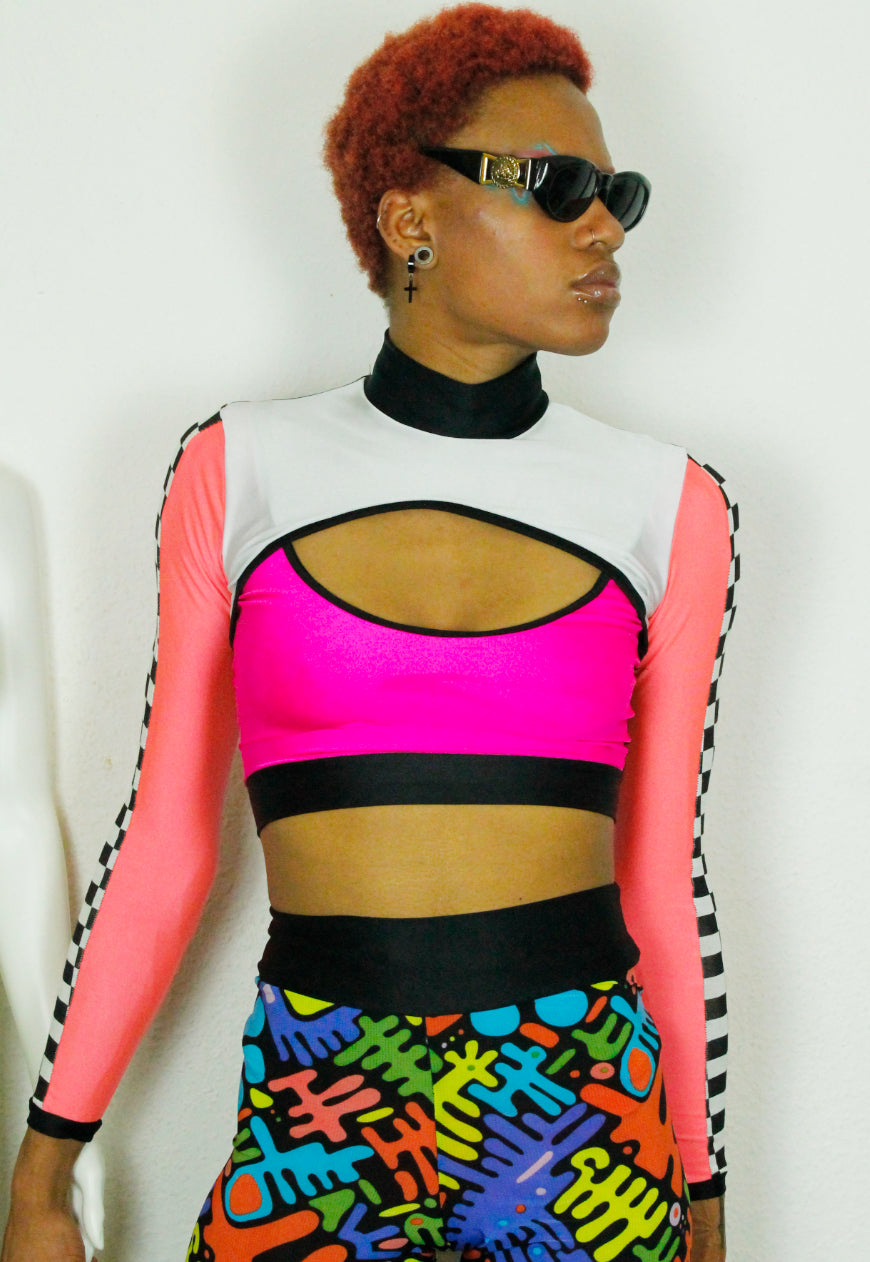 TRAILBLAZER NEON Pink neon peekaboo top with checkerboard sleeve detail