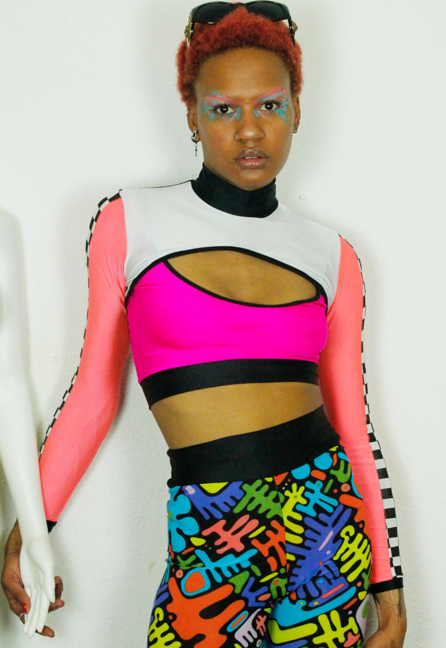 TRAILBLAZER NEON Pink neon peekaboo top with checkerboard sleeve detail