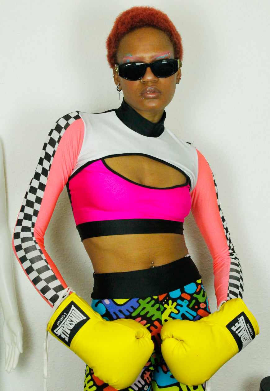 TRAILBLAZER NEON Pink neon peekaboo top with checkerboard sleeve detail