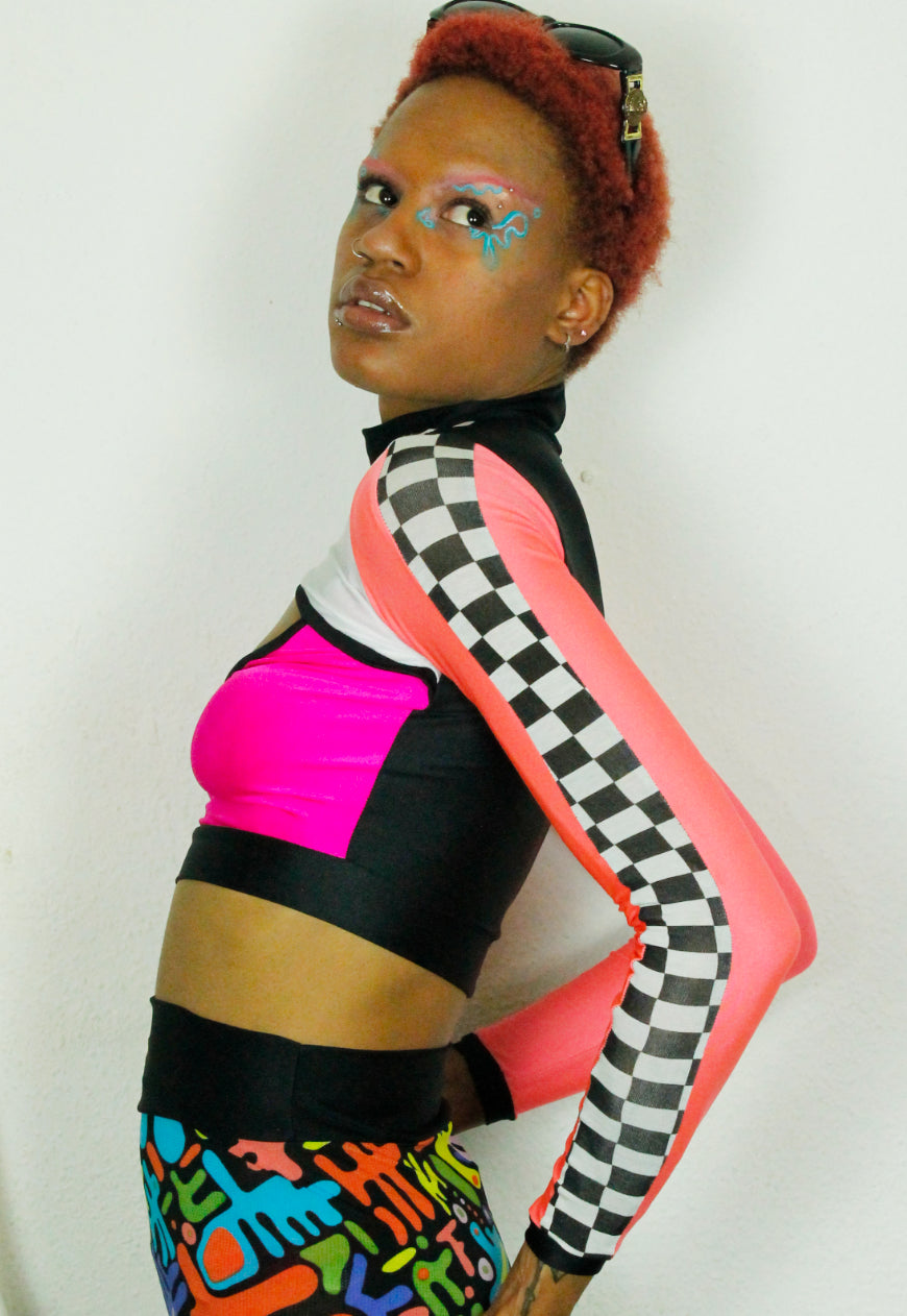TRAILBLAZER NEON Pink neon peekaboo top with checkerboard sleeve detail
