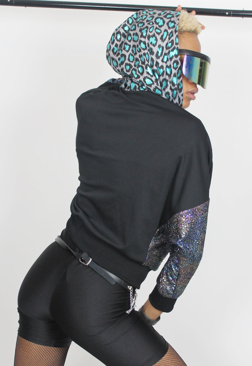 Vortex - Metallic leopard hooded batwing hooded top with reflective strips.