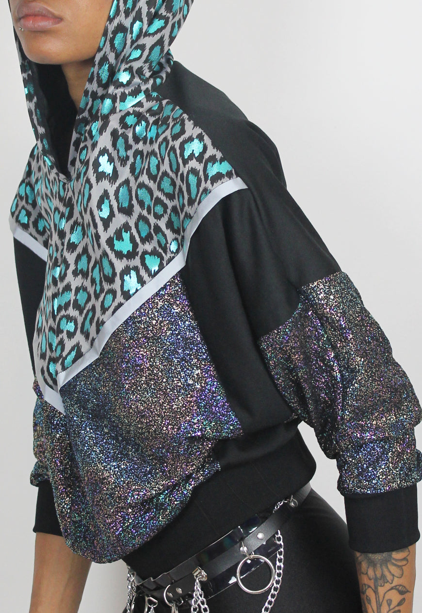Vortex - Metallic leopard hooded batwing hooded top with reflective strips.