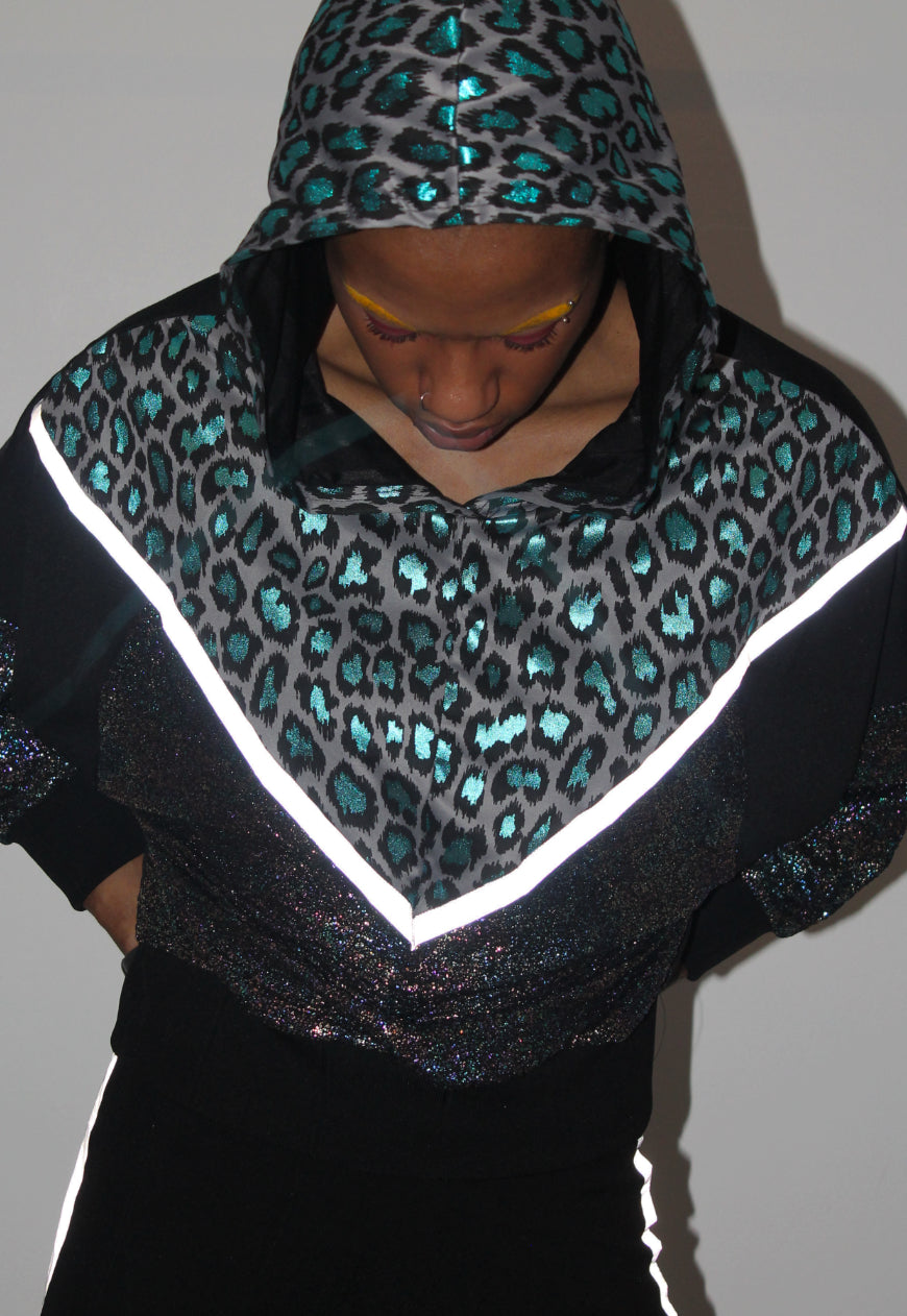 Vortex - Metallic leopard hooded batwing hooded top with reflective strips.