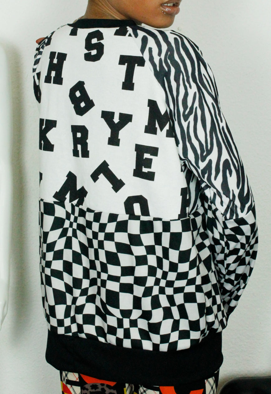 WORD UP Monochrome boyfriend sweater in checkerboard and zebra