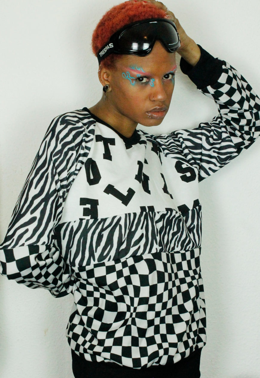 WORD UP Monochrome boyfriend sweater in checkerboard and zebra