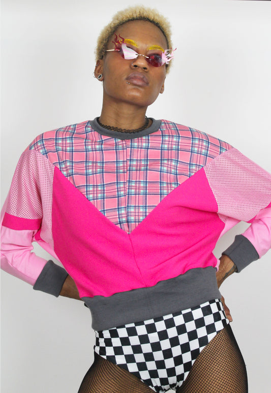 Dionne - Batwing colour block sweater with pink tartan panel