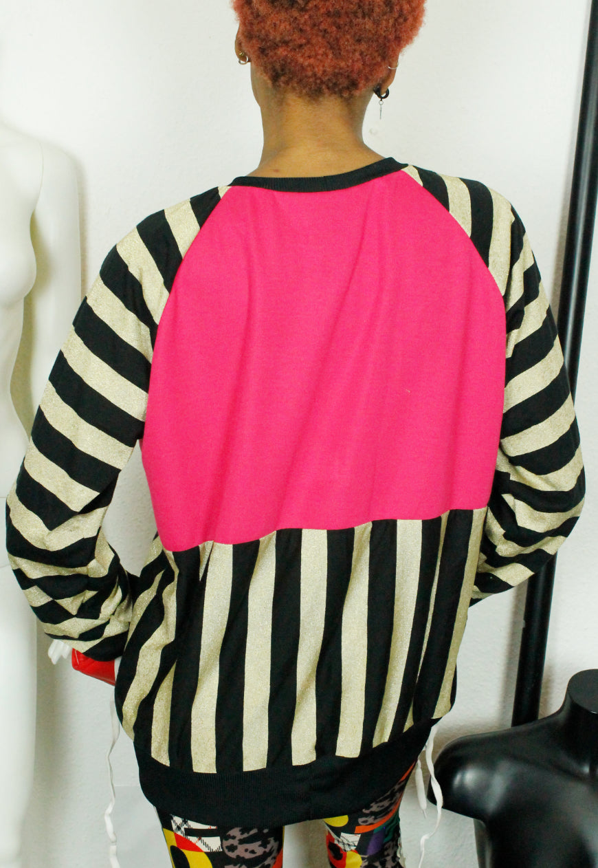 KNOCKOUT Pink, black and gold panel oversize sweater with heart and cross