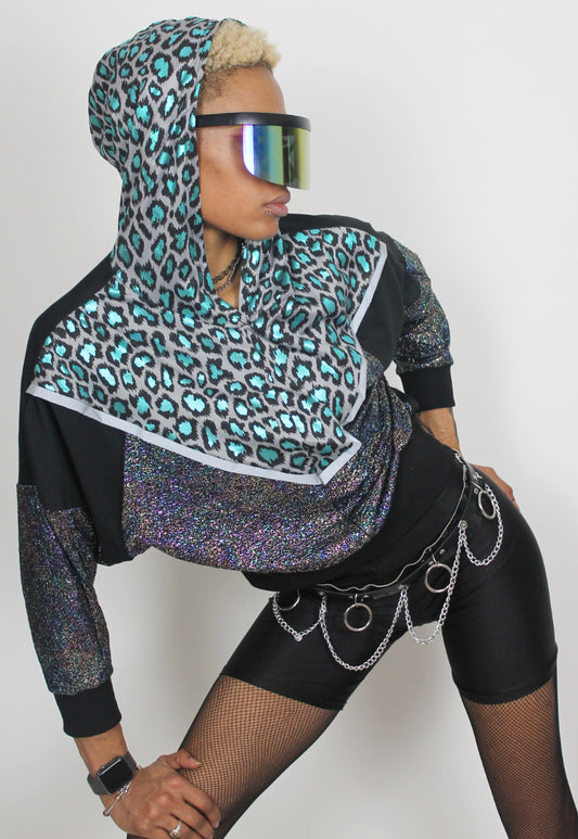 Vortex - Metallic leopard hooded batwing hooded top with reflective strips.
